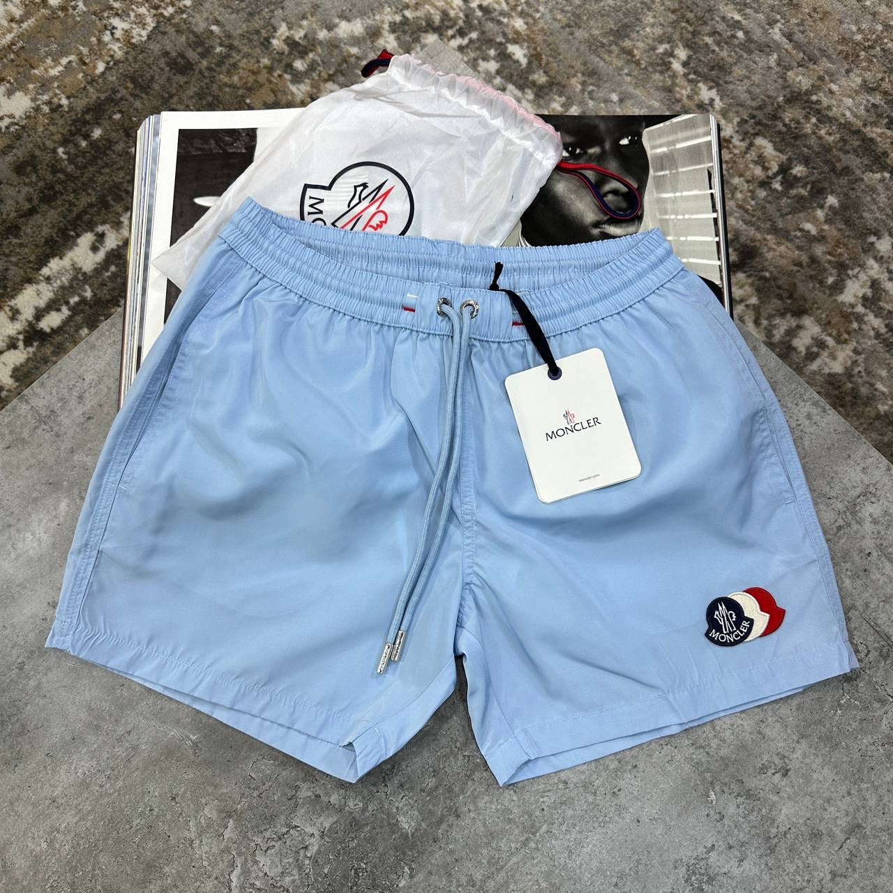 NCLR TRIPLE BADGE SWIM SHORTS LIGHT BLUE