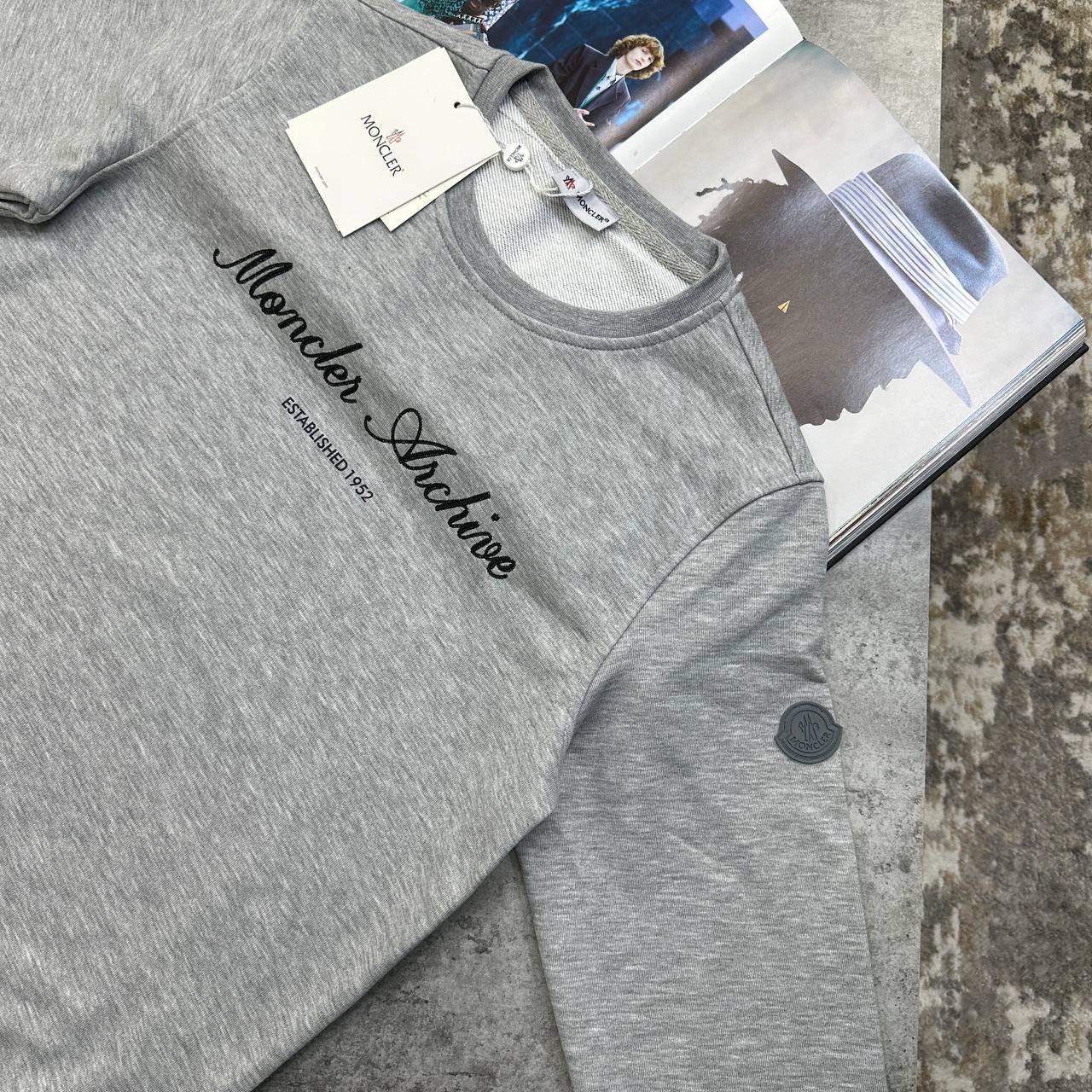 NCLR FRONT WRITTING JUMPER GREY