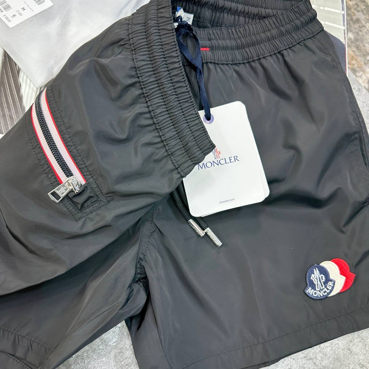 NCLR TRIPLE BADGE SWIM SHORTS BLACK